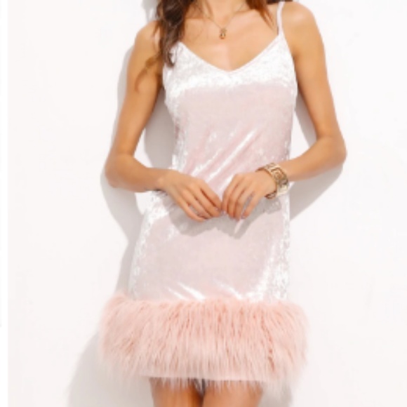 white dress with fluffy trim